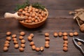 basket of nuts, nutcracker and the word nut on the table