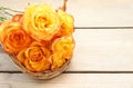 Basket of orange roses Royalty Free Stock Photo