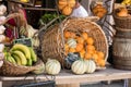 Basket of oranges and melons in a market stand of Moustiers Sainte-Marie in Provence, France Royalty Free Stock Photo