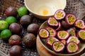 Basket passion fruits and passiflora edulis cut in half