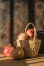 Basket with pomegranates