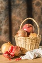 Basket with pomegranates