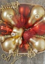 In a basket red and gold Christmas balls and space effect