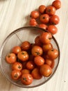 a basket of red tomatoes