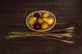 Basket of ripe fruit next to some dried wheat Royalty Free Stock Photo