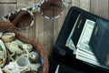 The basket of shells, sunglasses and wallet with dollars Royalty Free Stock Photo