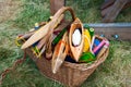 Basket with spindles and multicolored woolen yarn for hand weaving and spinning Royalty Free Stock Photo