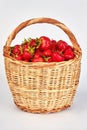 Basket with strawberries isolated on white. Royalty Free Stock Photo