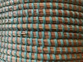 Basket texture, straw and turquoise rubber band Royalty Free Stock Photo