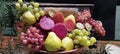 basket with varied fruits grape pear kiwi guava apple healthy food vegan detox food