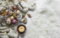 Basket with vintage christmas decorations on a fluffy white carpet, top view. Christmas background Royalty Free Stock Photo
