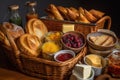 basket of warm breads with a variety of toppings, including butter and jams