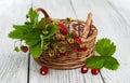 Basket with wild strawberries Royalty Free Stock Photo