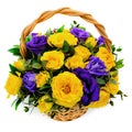 Basket with yellow and blue roses. Beautiful bouquet on white isolated background. Decorative composition of roses. Bright purple Royalty Free Stock Photo