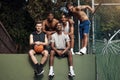 Basketball all day, every day. Portrait of a group of sporty young men hanging out on a basketball court. Royalty Free Stock Photo