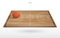 Basketball ball on basketball court with wooden floor pattern.