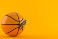 Basketball ball with clockwork key Royalty Free Stock Photo