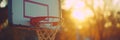 Basketball ball going through a basketball hoop during an intense game of basketball.
