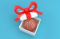 Basketball ball inside open gift