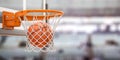 Basketball ball scoring the winning  points on basketball net hoop on basketball arena. Royalty Free Stock Photo