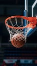 Basketball ball sinks into hoop, victory and achievement concept Royalty Free Stock Photo