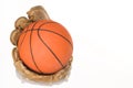 Basketball in baseball mitt Royalty Free Stock Photo