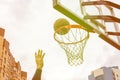 Basketball basket on the background of city houses. Street basketball Royalty Free Stock Photo