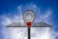Basketball basket seen from below with the blue sky Royalty Free Stock Photo