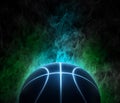 basketball with bright blue glowing neon lines on the color smoke background Royalty Free Stock Photo