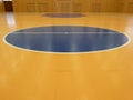 Basketball circle inside of sport hall.