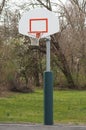 Nobody is using the outdoor basketball goal and backboard.