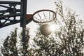 Basketball court net, silhouette and sports playing game, competition and action match outdoor. Empty background winning Royalty Free Stock Photo