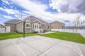 Basketball court and swings on the spacious yard of a single storey family home