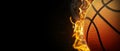 Basketball on fire on black background Royalty Free Stock Photo