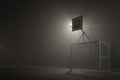 Basketball and football at night in the fog Royalty Free Stock Photo