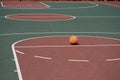 Basketball on free throwline en empty court Royalty Free Stock Photo