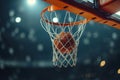 basketball game ball in hoop. winning points at a basketball game. Basketball, ball going through hoop. detail shot. Basketball Royalty Free Stock Photo