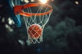 basketball game ball in hoop. winning points at a basketball game. Basketball, ball going through hoop. detail shot. Basketball Royalty Free Stock Photo
