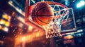 Basketball going through the basket at a sports arena (intention Royalty Free Stock Photo