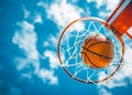 Basketball going through the hoop at sports arena Royalty Free Stock Photo