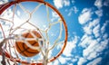 Basketball going through the hoop at sports arena Royalty Free Stock Photo