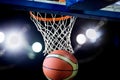 Basketball going through the hoop Royalty Free Stock Photo