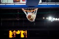 Basketball going through the hoop Royalty Free Stock Photo