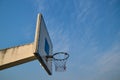 Basketball hoop against blue sky background Royalty Free Stock Photo