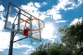 Basketball hoop against blue sky. Low angle view Royalty Free Stock Photo