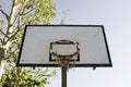Basketball hoop against a blue sky in sunny day - Vintage basketball hoop with a backboard - Metal basketball hoop - Lifestyle