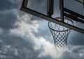 Basketball hoop against cloudy sky Royalty Free Stock Photo