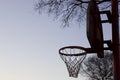 Basketball hoop with a backboard against a blue sky Royalty Free Stock Photo