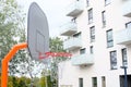 Basketball hoop with backboard in modern residential district