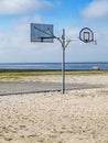 Basketball hoop on the beach vertical